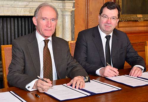 Prof David Greenaway and Prof John Ludden signing the collaboration agreement
