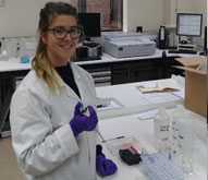 Kelsey analysing samples in the aqueous lab.